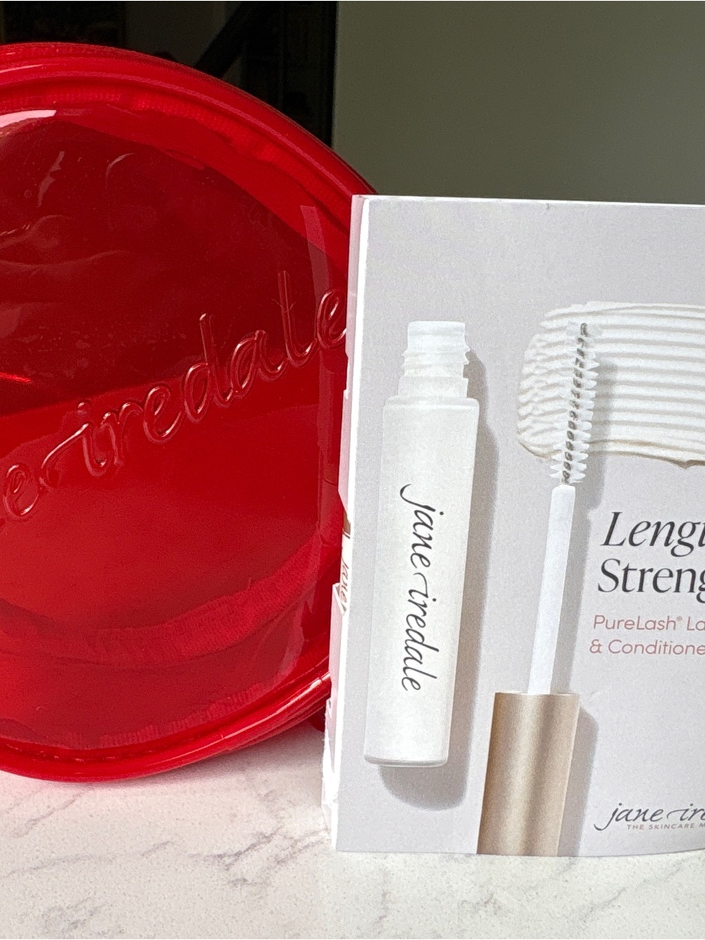 jane iredale White & Gold Lash Serum with Shiny Red Pouch